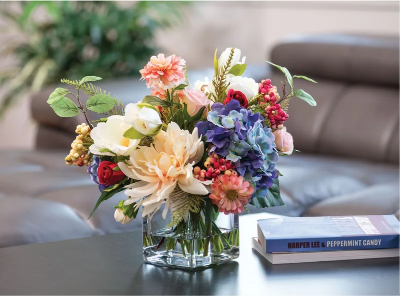 Dahlia, Hydrangea & Berries centerpiece styled on a coffee table