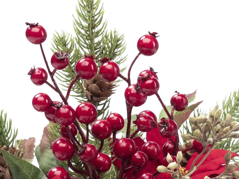 Close-up of glossy red berries with pine needles and a small cone