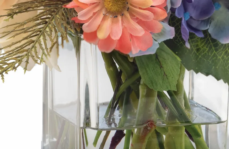 Crystal-clear acrylic water inside the 4-inch glass cube vase